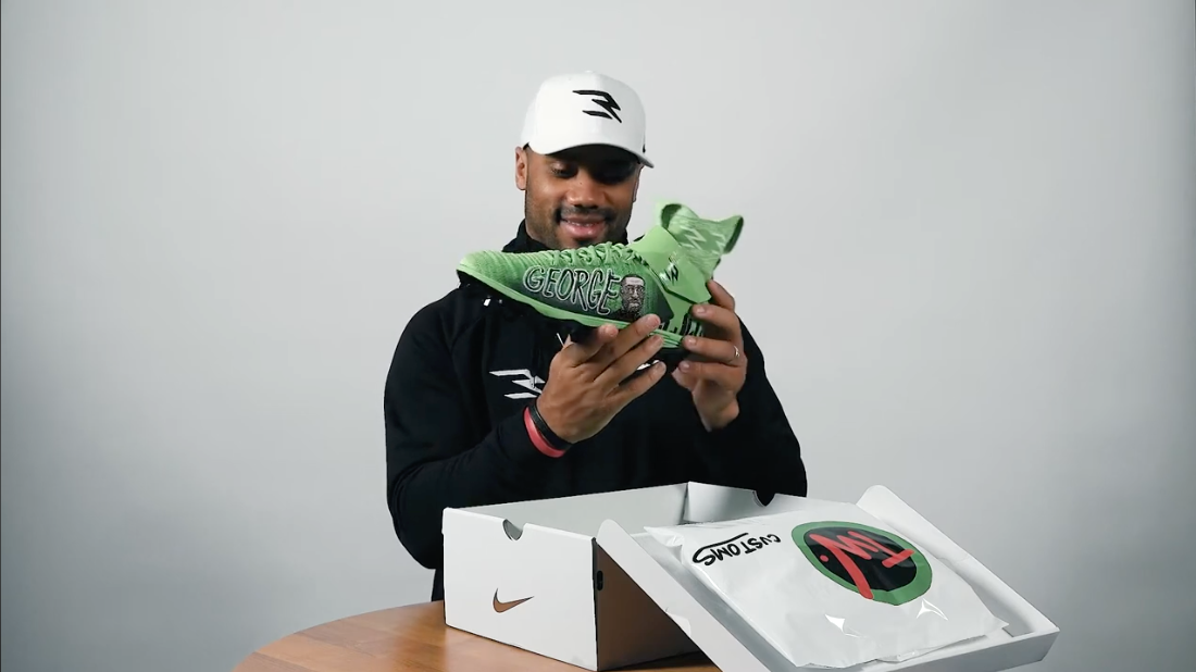 Load video: Russell Wilson opening TDUB Custom cleats